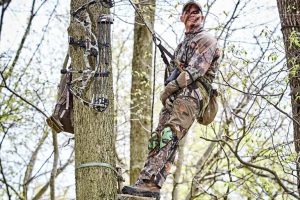 hunter in a saddle stand