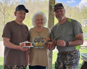 "A collection of custom-made turkey calls crafted by Roscoe Spaulding, displayed at the event."