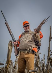 Hunter with pheasant