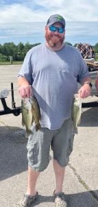 Fisherman wiht Bass