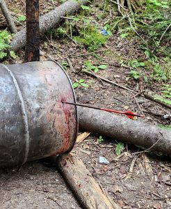 Arrow in a steel barrel