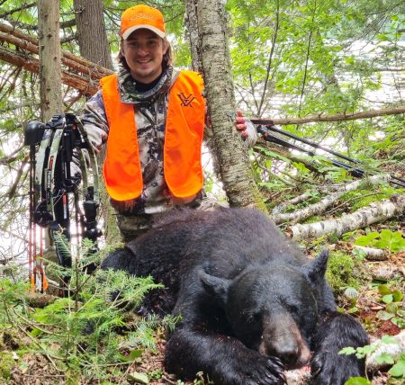 Jim with a successful bear hunt