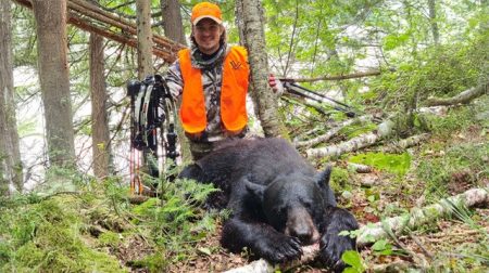 Hunter with bear