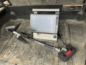 Author using his selected choice for best sonar for ice fishing