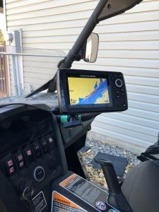 Author mounts his choice for best mapping fish finder to his can am to help find fish during ice fishing season