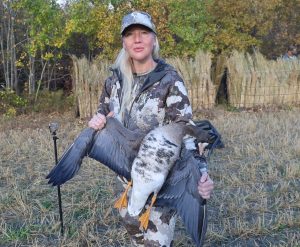 Hunter with Specklebelly goose