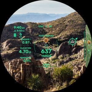 HUD overlay on a desert canyon: time 9:40 AM, compass 036° NE, target 637 yards with 'Save' option visible, and elevation data shown in teal green text.