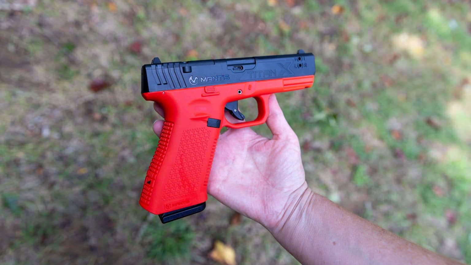 Mantis Titan X Review: Can One Week of Dry-Fire Training Improve Accuracy? Mantis Titan X smart laser training pistol shown in profile