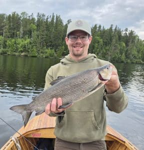 Angler with a beautiful Esnagi Lake Whitefish