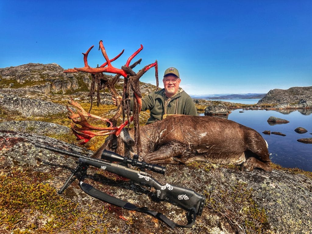 Author with a giant caribou taken in Greenland