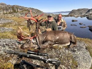 Brad Fenson and his Greenlandic guide, Otto with a caribou taken while Greenland caribou hunting